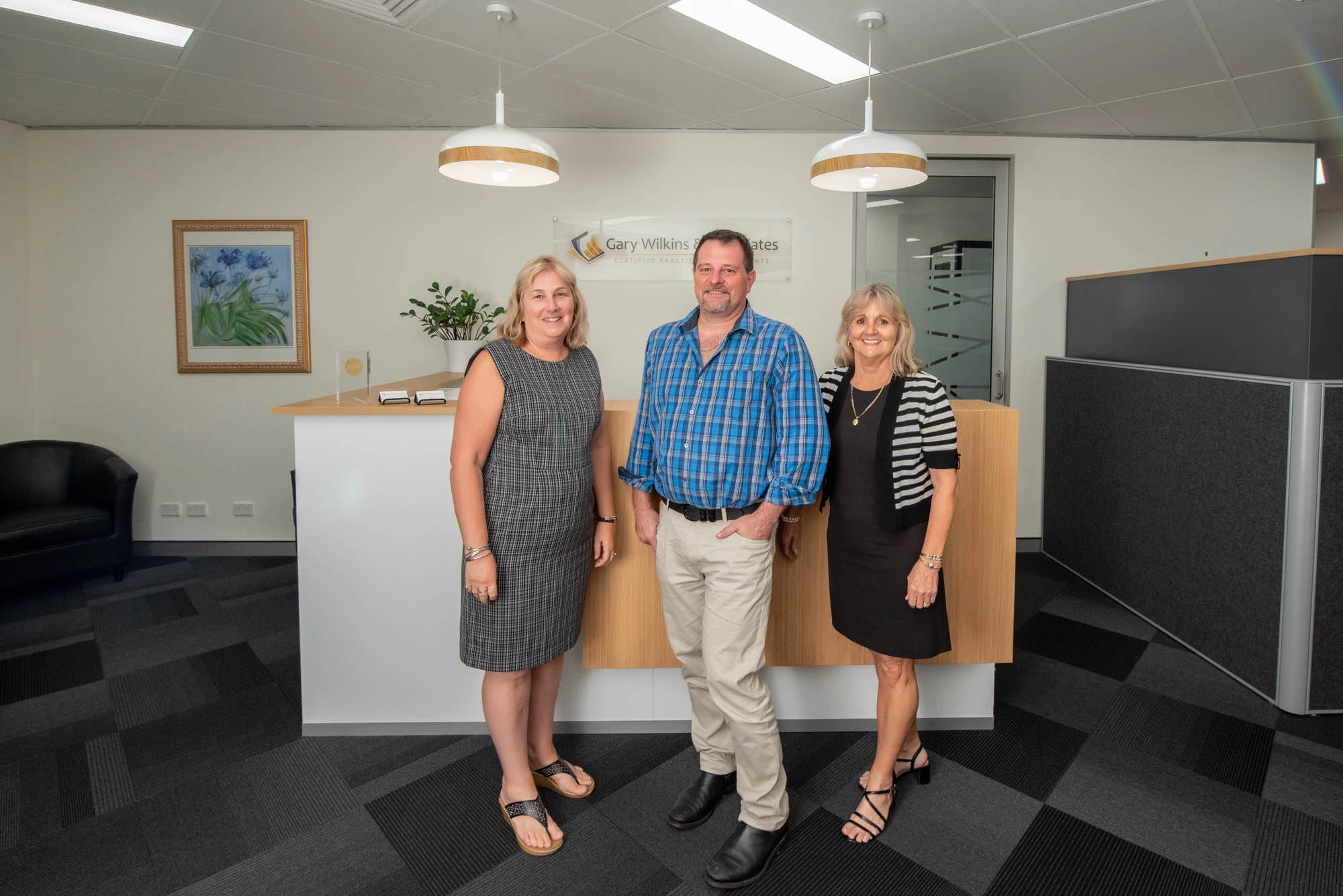 Gary wilkins and team at accounting firm Gary wilkins and team at accounting firm